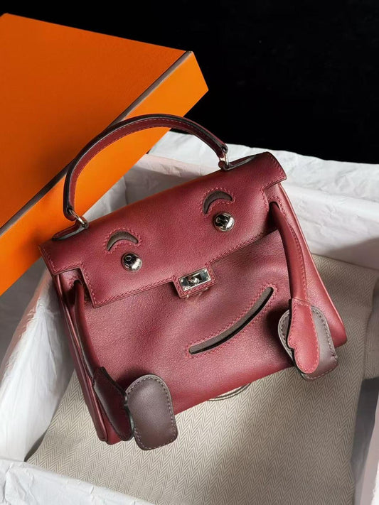 Hermès Kelly Doll Red Burgundy Swift Leather with palladium hardware