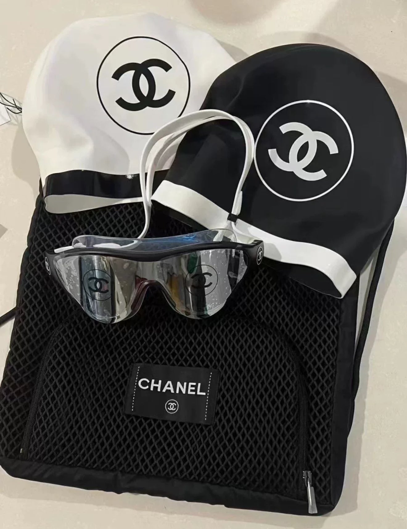 Chanel 24S swimming suit
Glasses + black swimming cap + white swimming cap + backpack
Brand new complete set