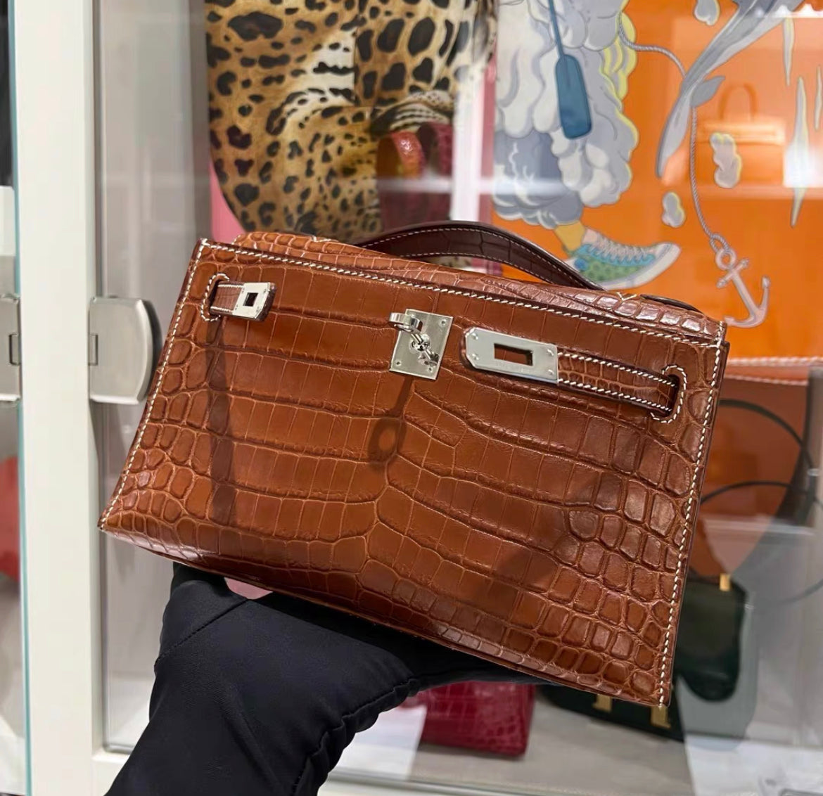 HERMÈS KELLY POCHETTE FAUVE BARÉNIA NILOTICUS CROCODILE PALLADIUM HARDWARE