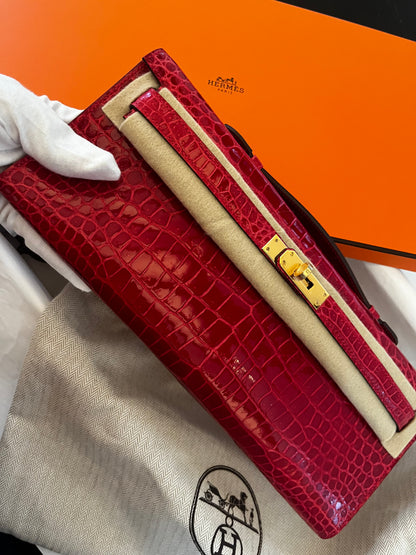 Hermes Kelly cut Braise shiny porosus crocodile leather gold hardware