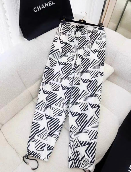 Chanel 23M coco beach white and black star pants size 34 – Wararni.com