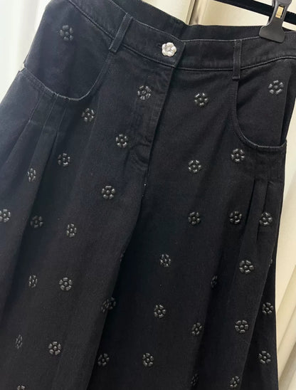 Chanel 23K black camellia wide-leg denim pants