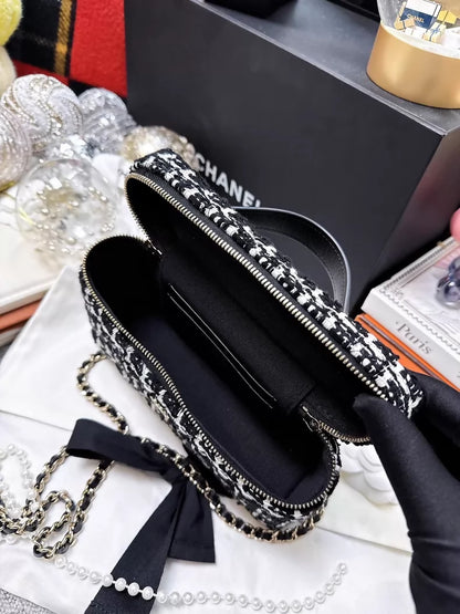 Chanel 25C black and white tweed case bag with silver hardwar