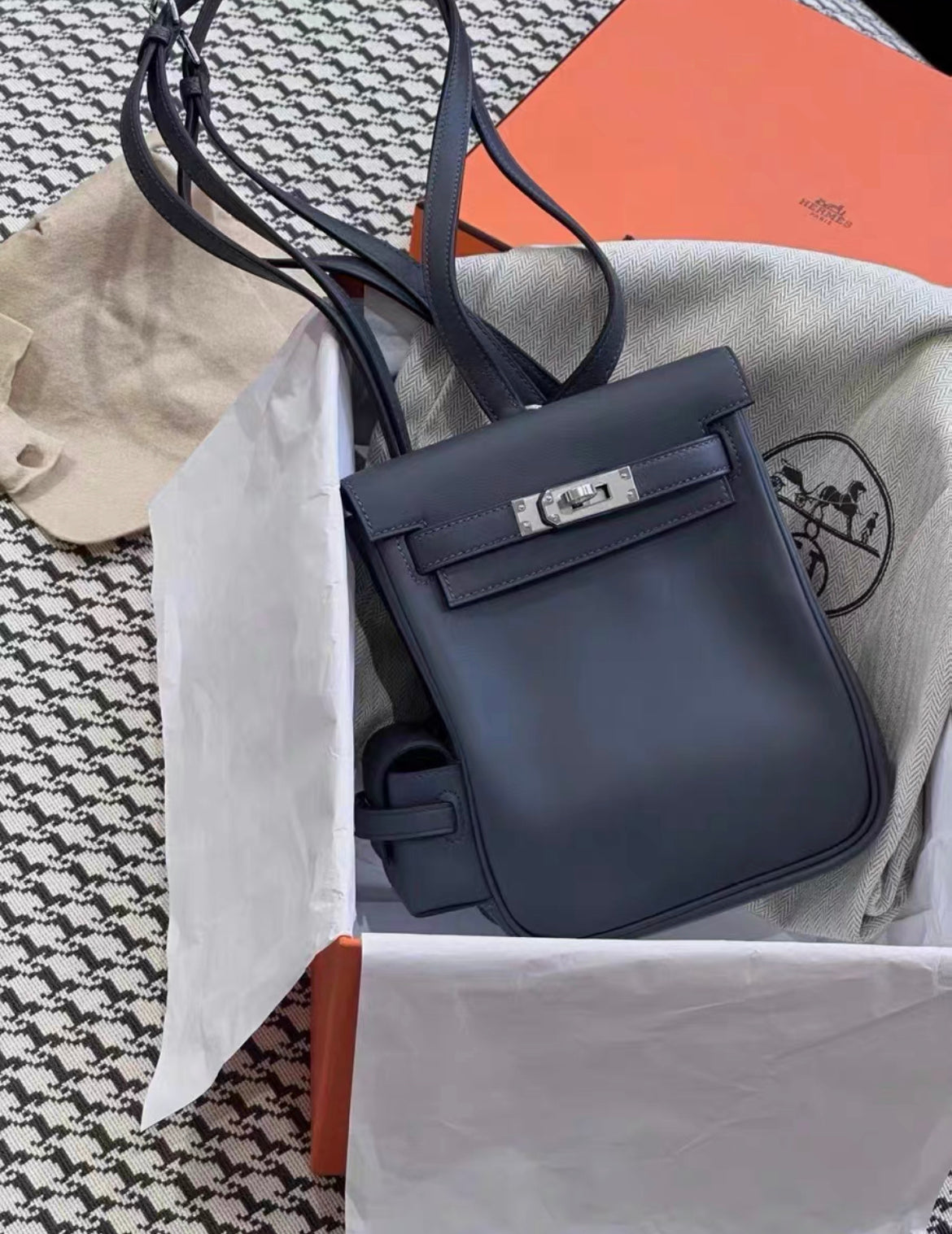 Hermès Kelly ado pockets swift leather palladium hardware