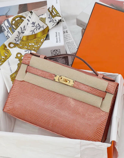 Hermès Kelly Pochette Pink lizard Gold Hardware