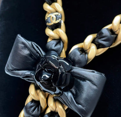 Chanel 20A tie style gold & black ribbon bow with camellia flower leather chain necklace