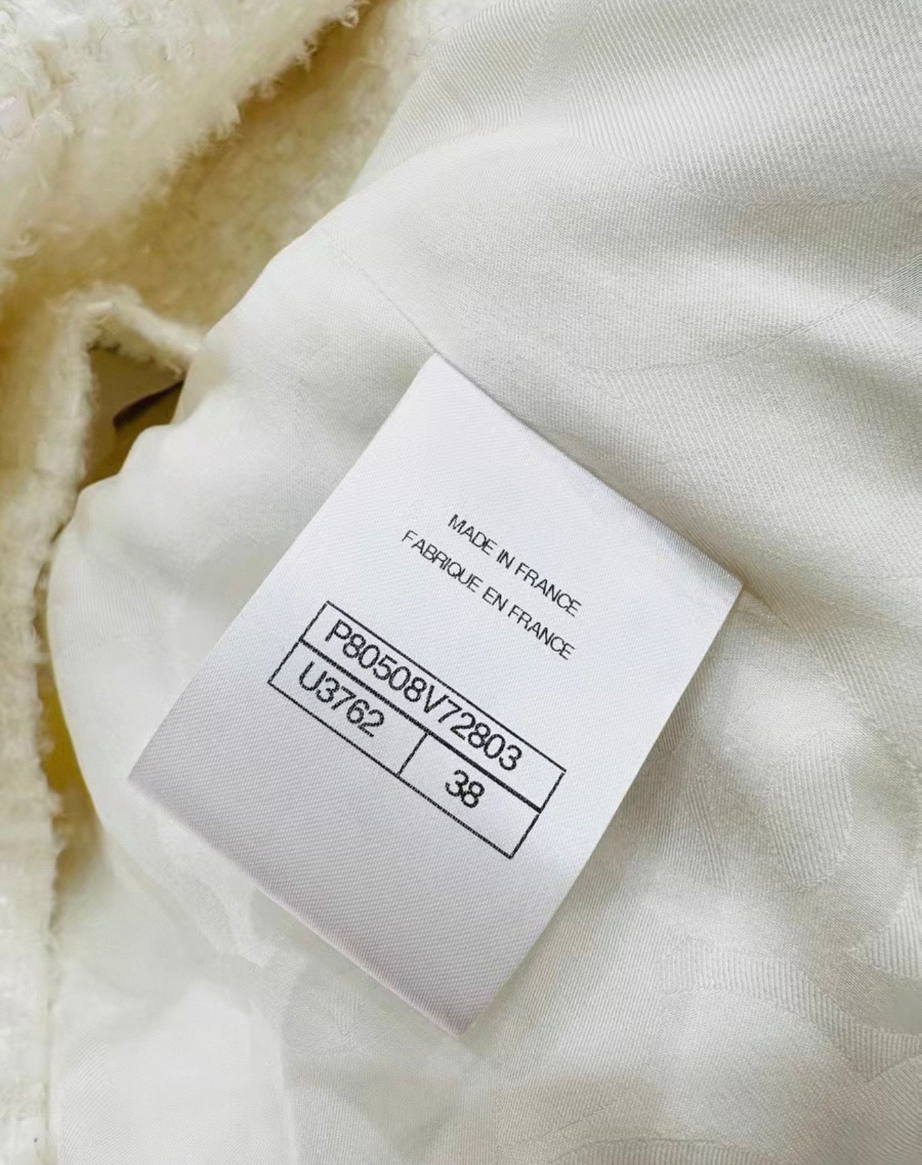 Chanel 25k white tweed jacket
