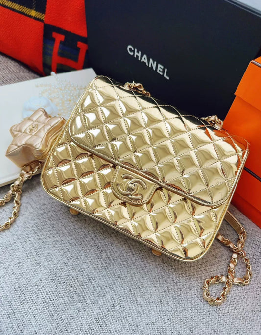 Chanel 24C gold mirror star backpack