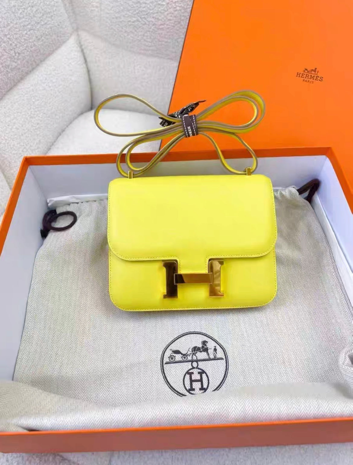 HERMÈS Constance Mini 19 shoulder bag in Lime Swift leather with Gold hardware