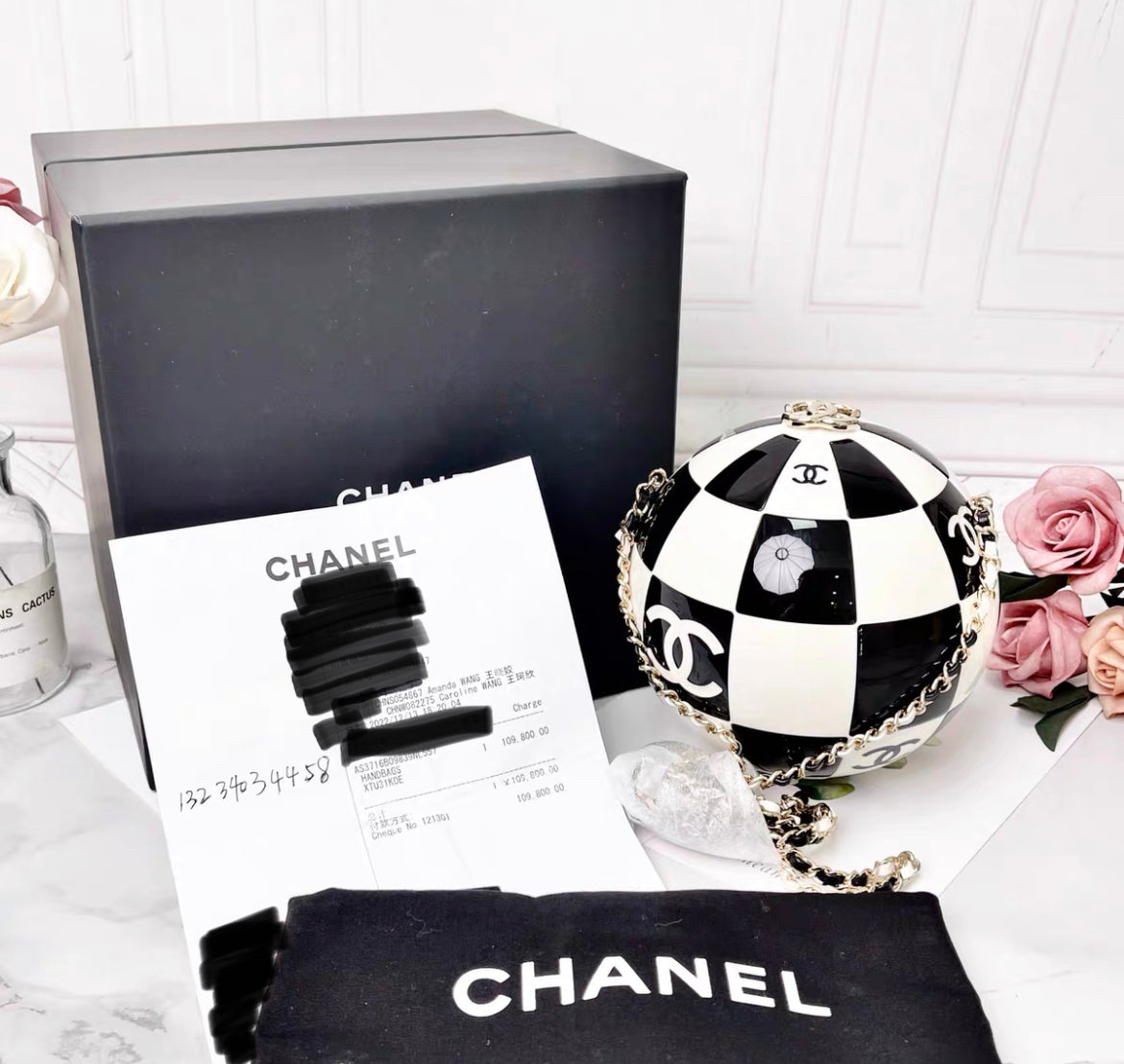 Chanel Black and White Resin and Enamel Checker Sphere Minaudiere Pale Gold Hardware, 2023