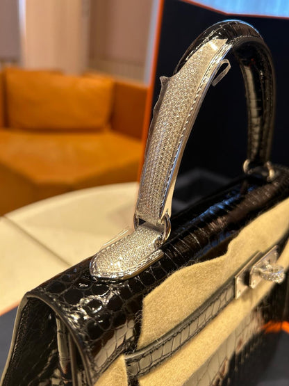HERMES KELLY 25 MIDAS SHINY BLACK POROSUS CROCODILE SELLIER WITH 18K WHITE GOLD HARDWARE & DIAMOND HANDLE