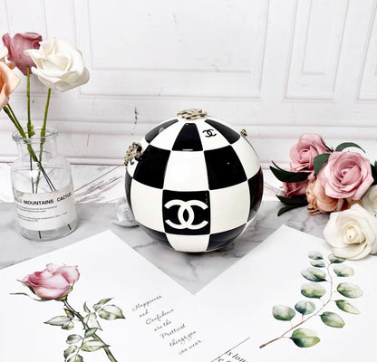 Chanel Black and White Resin and Enamel Checker Sphere Minaudiere Pale Gold Hardware, 2023