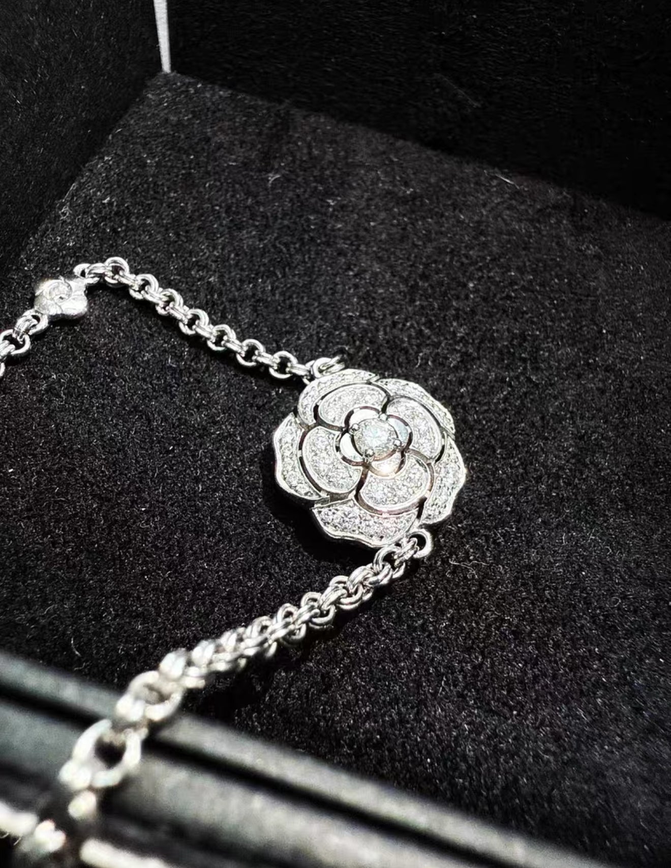 Chanel high jewellery 10 camellia flowers in 18k white gold and diamonds
