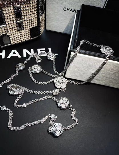 Chanel high jewellery 10 camellia flowers in 18k white gold and diamonds