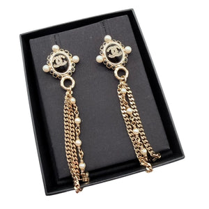 CHANEL black and gold tassel earrings