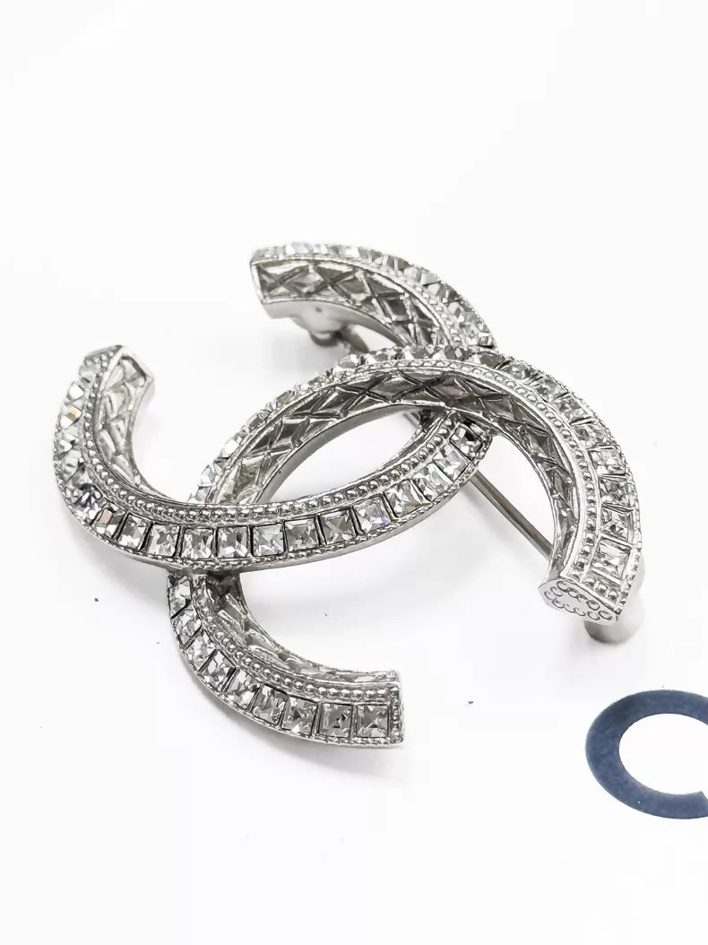 Chanel 23P silver brooch with full diamond embossing