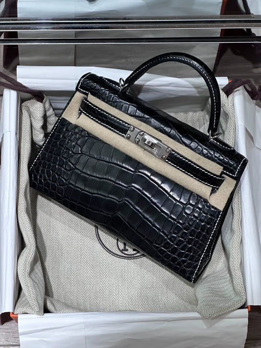 Hermes mini Kelly 20 black matte crocodile leather palladium hardware with white stitching