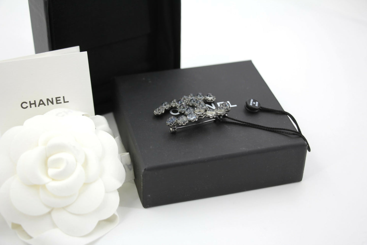 Chanel 17K Rhinestone Starlight Blue CC Brooch