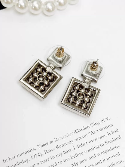 Chanel Spring/Summer 2024 silver double C pearl stud earrings