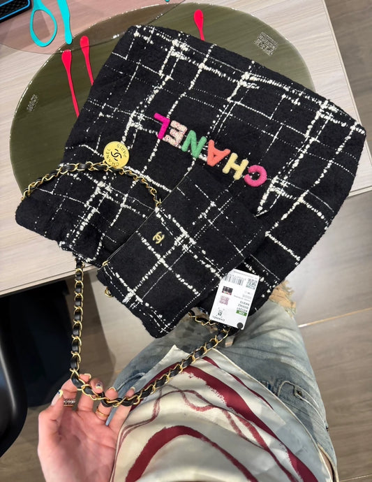 Chanel 22k tweed bag with Multicolor CC letters medium size