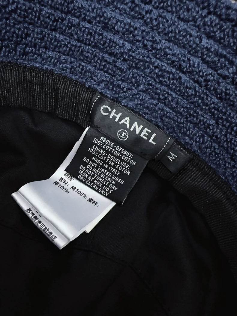 Chanel classic khaki hat with navy blue terry cloth lining