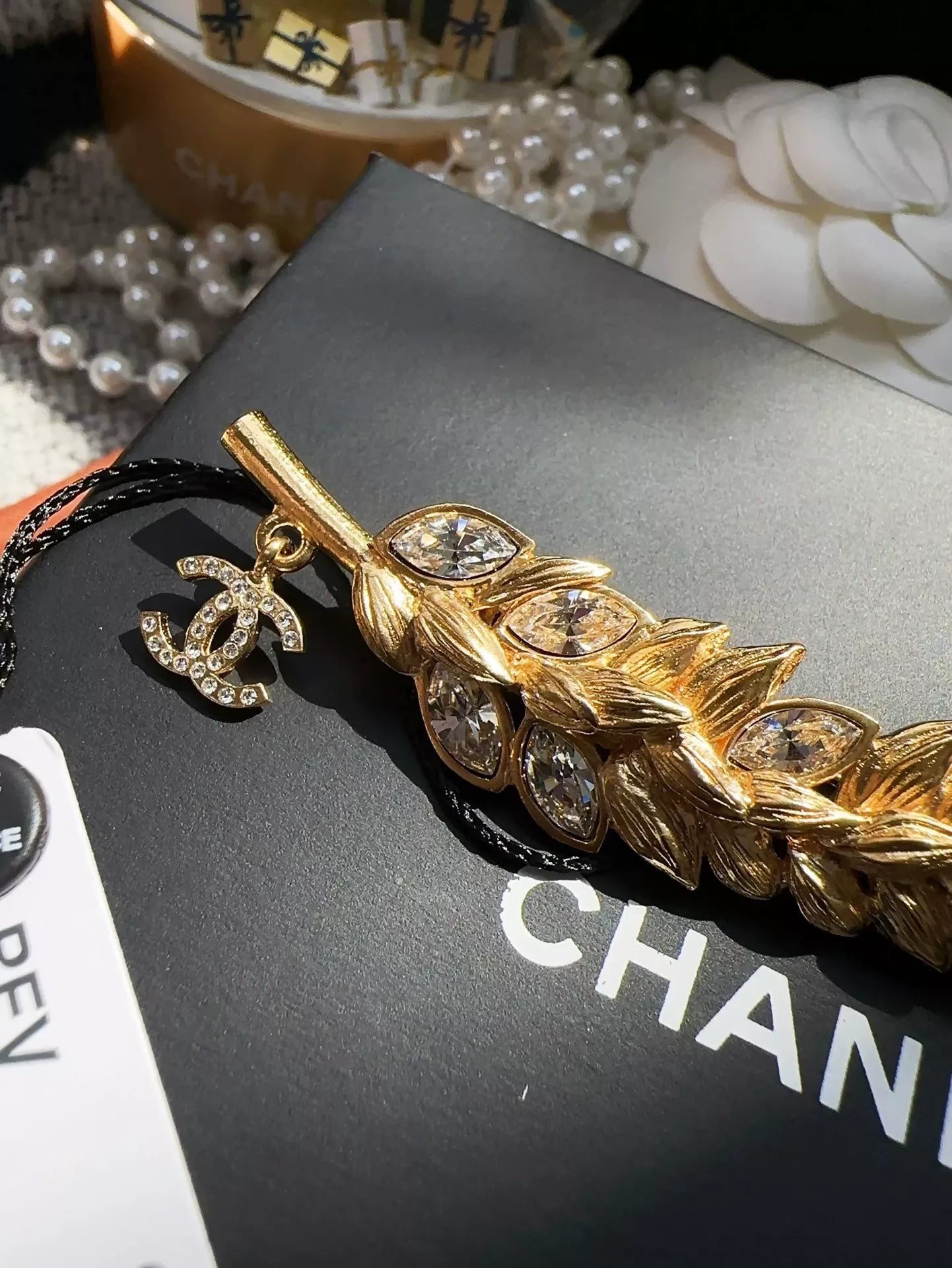 CHANEL classic golden wheat rhinestone brooch
