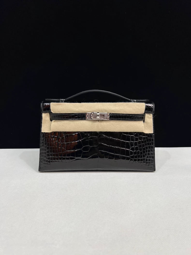 Hermes Kelly Pochette Black shiny Crocodile Leather with palladium hardware