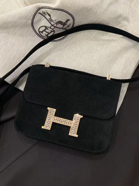 Hermès constance 14 black doblis with gold and diamonds hardware