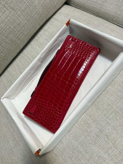 Hermes Kelly Cut Braise shiny porosus gold hardware
