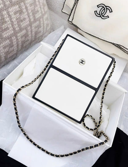 CHANEL 21SS A LIMITED EDITION WHITE & BLACK LEATHER CHANEL NO. 5 PARFUM BOX CLUTCH