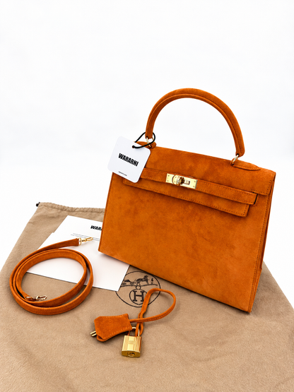 Hermès Kelly 25 Orange Doblis suede leather gold diamond hardware