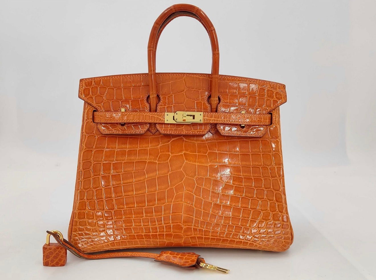 Hermes Birkin 25 Orange shiny porosus crocodile leather Gold hardware