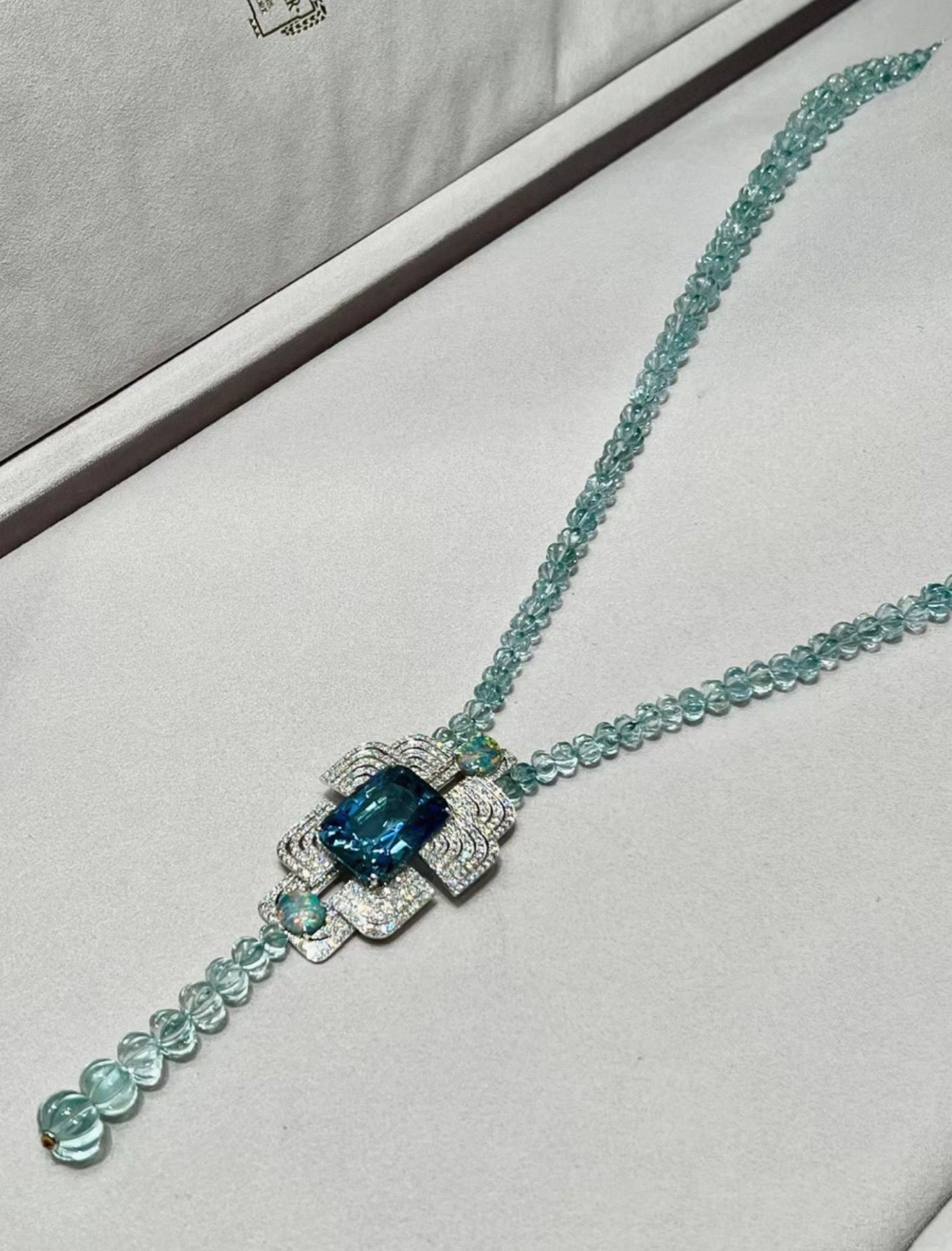 Cartier High Jewelry Necklace - Main stone: 37-carat aquamarine; two opals; chain beads: topaz.