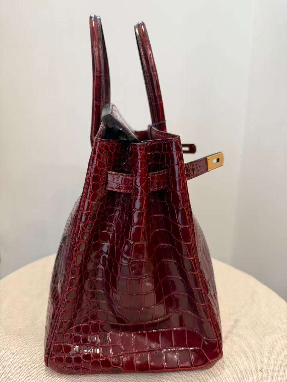 Rare Hermes Birkin 35 shiny Porosus Bordeaux Shiny Porosus Crocodile leather Gold hardware
