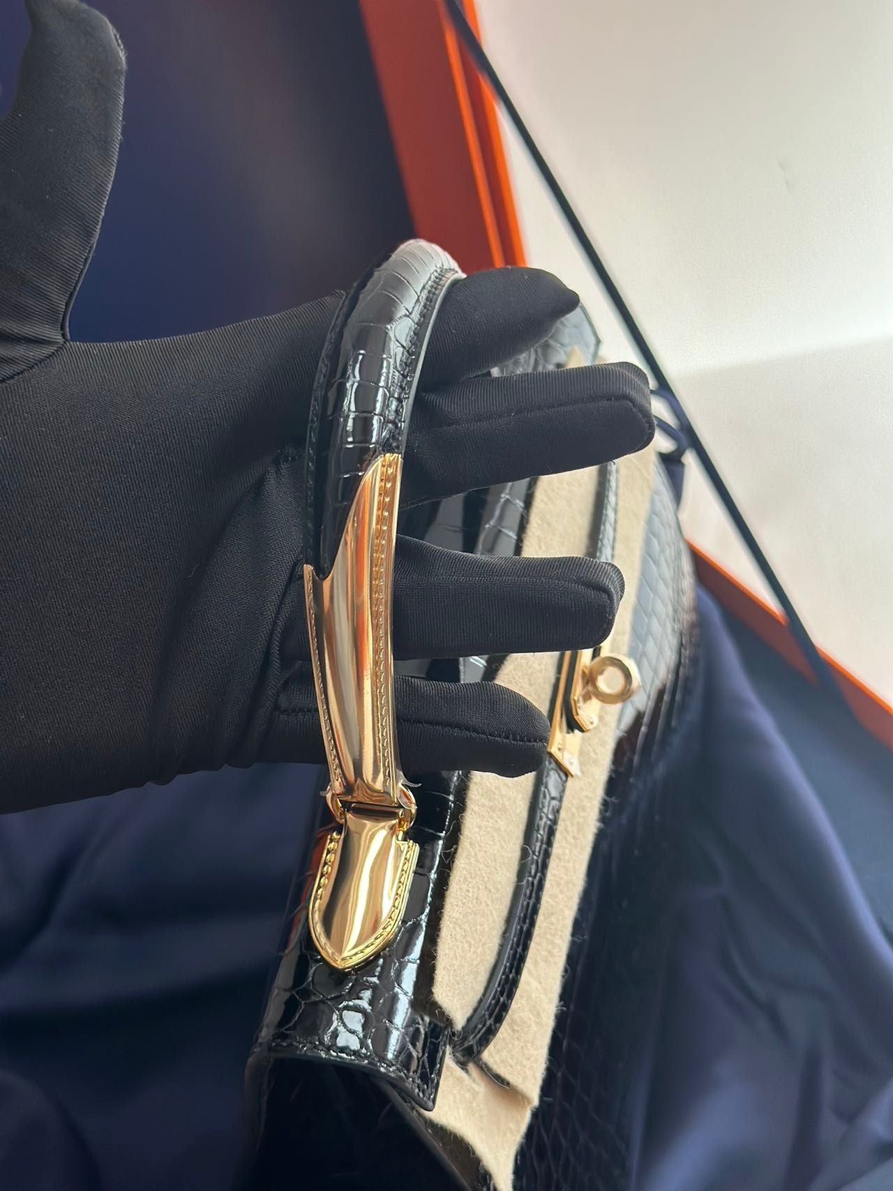 Hermès Kelly Midas 25 Noir Shiny Crocodile Porosus 18k yellow gold hardware & handle