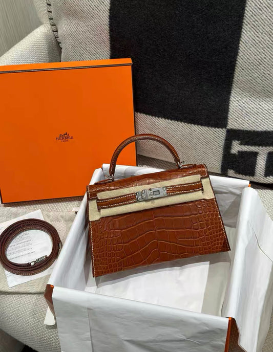 HERMÈS Alligator Mini Kelly in Gold with Palladium hardware handbag Brand New Stamp W