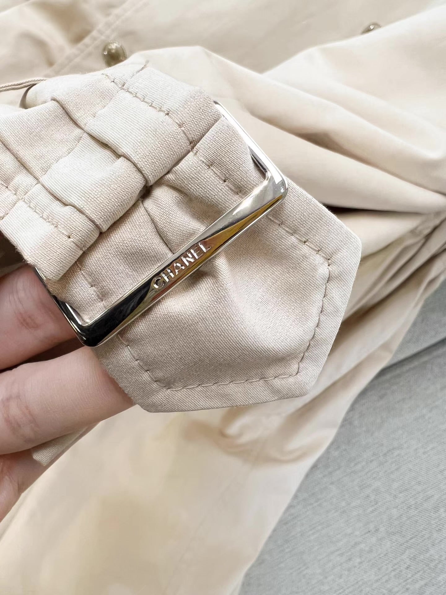 Chanel 25B trench coat with CC logo print