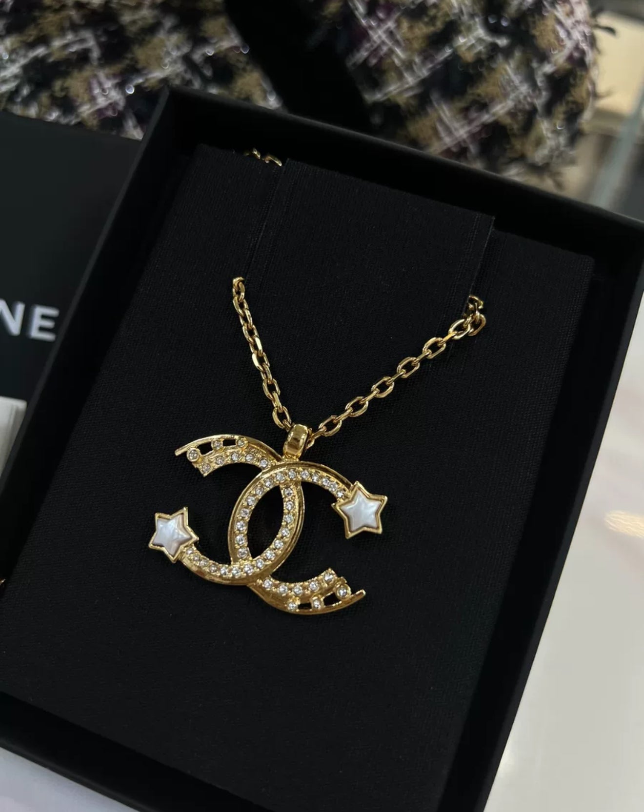 Chanel 24C gold shooting star double C necklace
