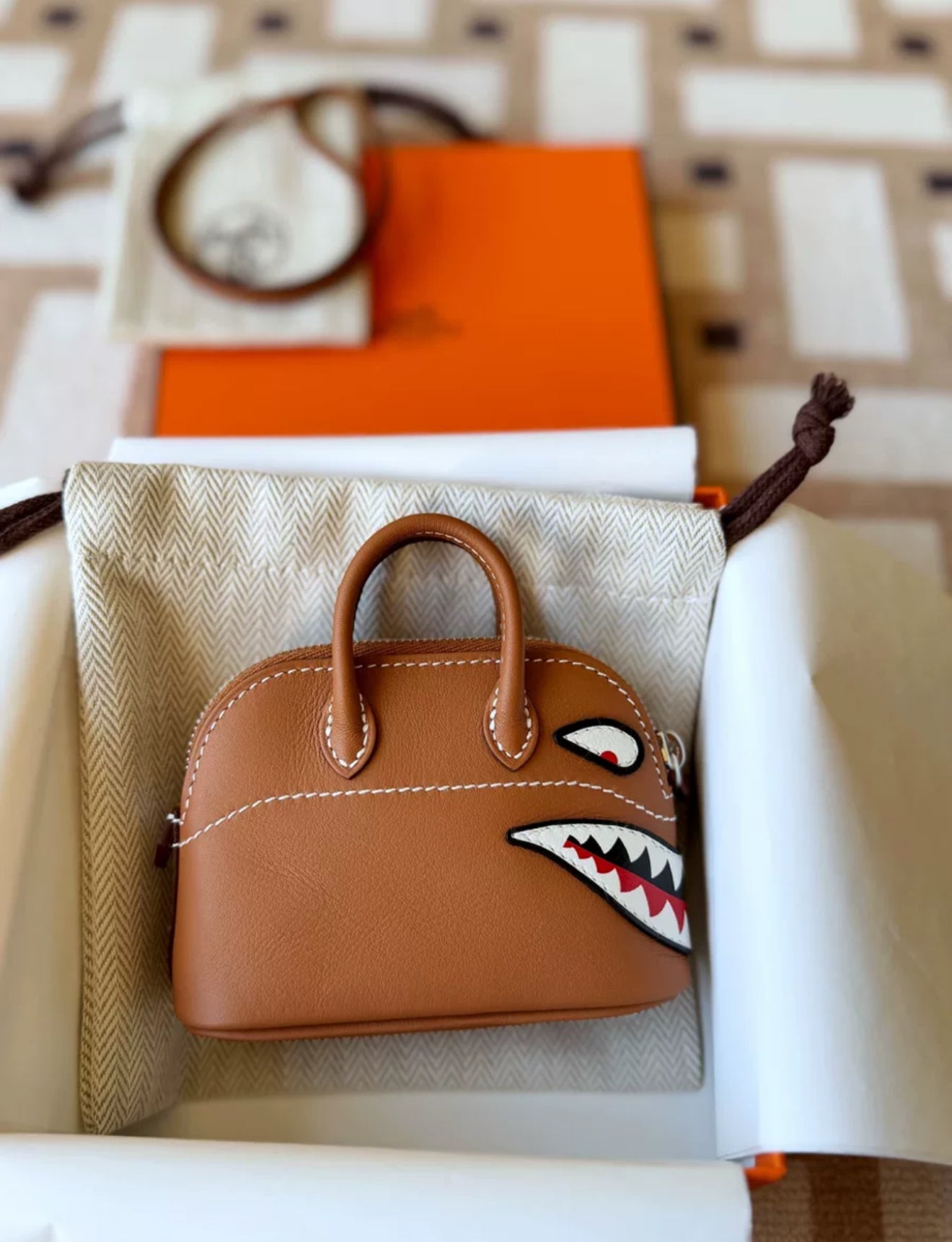 HERMÈS GOLD SWIFT MINI BOLIDE SHARK BAG CHARM