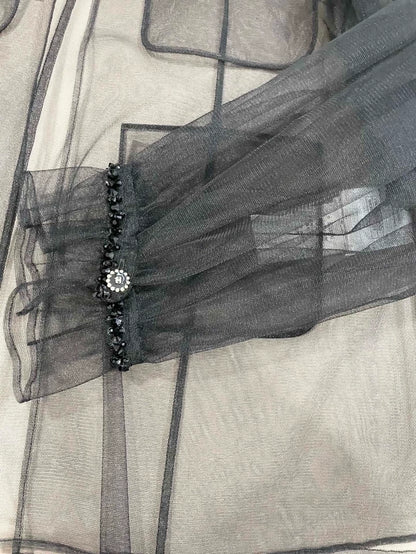 Chanel 25K black tulle blouse with bow