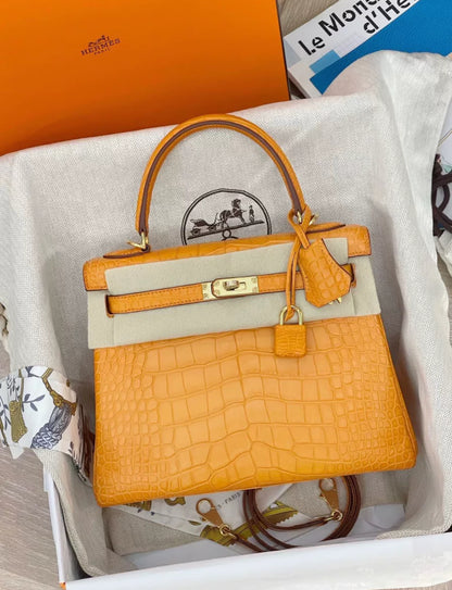 Hermès Kelly 25 Orange Matte Crocodile Gold Hardware