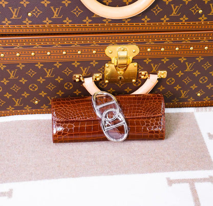 HERMÈS EGEE CLUTCH IN CROCO NILOTICUS BROWN PALLADIUM HARDWARE