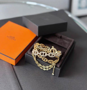 Hermès Chaine d’Ancre Enchaînée bracelet in yellow gold with pavé diamonds