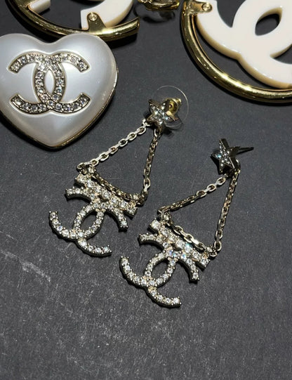 Chanel 22S Double CC Rhinestone Star Earrings