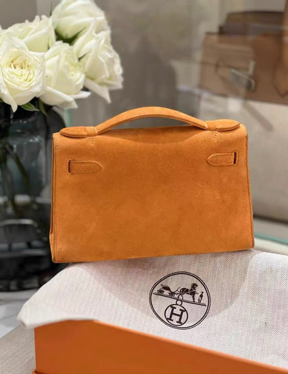 HERMES Veau Doblis Kelly Pochette Orange