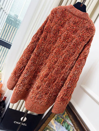 Chanel 22K orange cardigan