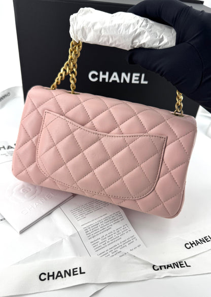 Chanel pink mini flap bag with gold hardware
