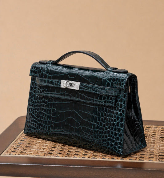 Hermès Kelly pochette Vert Cypress Shiny Porosus white gold Diamond hardware