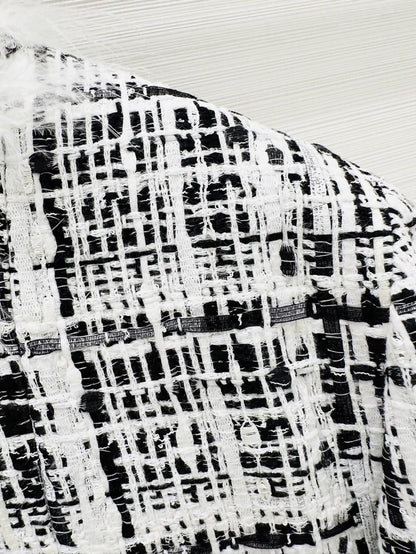 Chanel 25S black and white tweed jacket