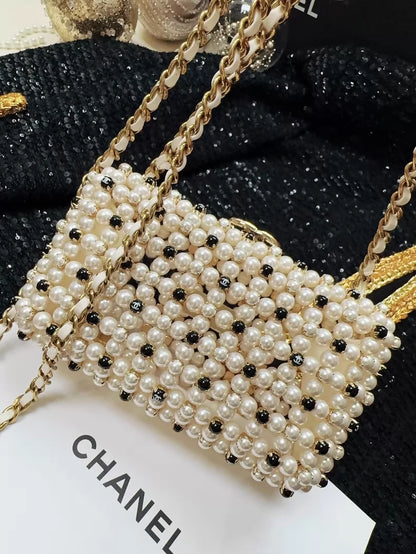 Chanel 23S black and white gold metallic pearls, chain bag